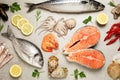 Fresh fish and seafood on grey table, flat lay Royalty Free Stock Photo
