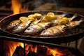 fresh fish sizzling on a boat grill with lemon slices