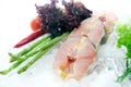 Fresh fish sliced on white background decorated Royalty Free Stock Photo