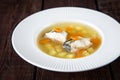 Fresh fish soup with pike perch and vegetables in a white plate Royalty Free Stock Photo