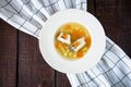 Fresh fish soup with pike perch and vegetables in a white plate Royalty Free Stock Photo