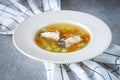 Fresh fish soup with pike perch and vegetables in a white plate Royalty Free Stock Photo