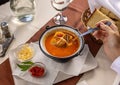 Fresh fish soup in small cauldron Royalty Free Stock Photo