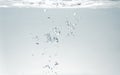 Fresh fizzy water in the glass with bubbles background, close up view, health, diet nutrition Royalty Free Stock Photo