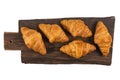 Fresh flavorous croissant on wooden table isolated on white Royalty Free Stock Photo