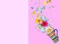 fresh flowers flying out from a tea cup isolated over color clock pint and purple background, spring or summer concept