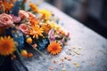 fresh flowers placed on an ancient grave