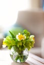 Fresh flowers in round vase