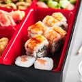 Fresh Food Portion in Japanese Bento Box with Sushi Rolls Royalty Free Stock Photo