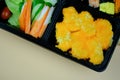 Fresh food portion in Japanese bento box with sushi rolls Royalty Free Stock Photo