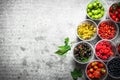 Fresh forest berries in the glasses. On stone table. Royalty Free Stock Photo