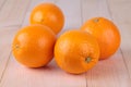 Fresh four orange on wood table