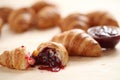 Fresh french croissants with berry jam