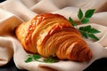 Fresh French croissants on fabric