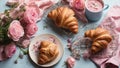 Fresh French croissants on the kitchen table.