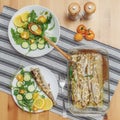 Fresh fried fish with vegetables served on plate, top view Royalty Free Stock Photo