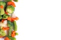 fresh frozen vegetables including broccoli, celera, onion, broccoli on white background Royalty Free Stock Photo