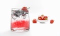 Fresh fruit alcohol cocktail or mocktail in classic clear glass with ice cubes. Strawberry cocktails. Alcoholic beverages mixed