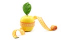 Fresh fruit apple with green leaf and measuring tape. Royalty Free Stock Photo