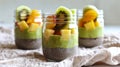 Fresh Fruit Chia Pudding in Glass Jars on Table Royalty Free Stock Photo
