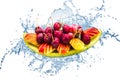 Fresh fruit on creative splash water in isolated background Royalty Free Stock Photo