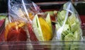 Fresh fruit cut up on street fair, mango,cucumber,watermelon.