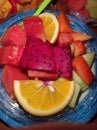 Fresh fruit: dragon fruit, lemon, papaya, melon, watermelon, orange