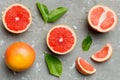 fresh Fruit grapefruit with Juicy grapefruit slices on colored background. Top view. Copy Space. creative summer concept Royalty Free Stock Photo