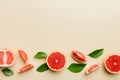 fresh Fruit grapefruit with Juicy grapefruit slices on colored background. Top view. Copy Space. creative summer concept. Half of Royalty Free Stock Photo