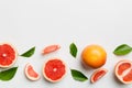 fresh Fruit grapefruit with Juicy grapefruit slices on colored background. Top view. Copy Space. creative summer concept. Half of Royalty Free Stock Photo