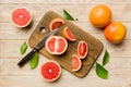 fresh Fruit grapefruit slices on colored background. Top view. Copy Space. creative summer concept. Half of citrus in Royalty Free Stock Photo