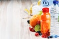Fresh fruit juice and fitness accessories Royalty Free Stock Photo