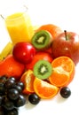 Fresh fruit and juice isolated on white Royalty Free Stock Photo