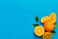 fresh Fruit orange slices on colored background. Top view. Copy Space. creative summer concept. Half of citrus in Royalty Free Stock Photo