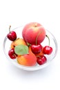 Fresh fruit peaches apricots cherries on white bac Royalty Free Stock Photo