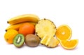 Fresh fruit - pineapple, kiwi, oranges, lemon and bananas on white background Royalty Free Stock Photo