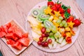 Fresh Fruit Platter. Raw Organic Fruit Platter With Berries, Melons, Kiwi, Mango, Pineapple, Carambola, Watermelon Royalty Free Stock Photo