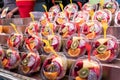 Fresh fruit salad cut and packaged. Food and drink for the summer at the beach or in the city, colorful fruits on a market