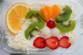 Fresh fruit salad filled with grated cheese