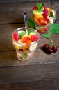 Fresh fruit salad, healthy delicious vegetarian food Royalty Free Stock Photo