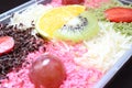 Fresh fruit salad of melon, grape, strawberry, kiwi Royalty Free Stock Photo