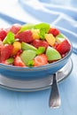 Fresh fruit salad with strawberry, apple, nectarine, pomegranate