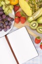 Fresh fruit salad vertical, strawberries, recipe book, copy space Royalty Free Stock Photo