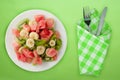 Fresh fruit salad on white plate on background. healthy food top view Royalty Free Stock Photo