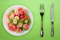 Fresh fruit salad on white plate on background. healthy food top view Royalty Free Stock Photo