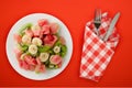 Fresh fruit salad on white plate on background. healthy food top view Royalty Free Stock Photo