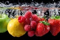 Fresh Fruit Splash with Strawberries Raspberries Lemon and Apple Royalty Free Stock Photo