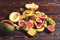 Fresh fruit variety on wood. Food background of tropical fruit Royalty Free Stock Photo