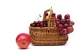 Fresh fruit in a wicker basket on a white background Royalty Free Stock Photo