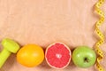 Fresh fruits, centimeter and dumbbells for fitness, healthy lifestyles Royalty Free Stock Photo